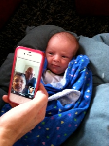 Baby facetiming with his great grandparents.